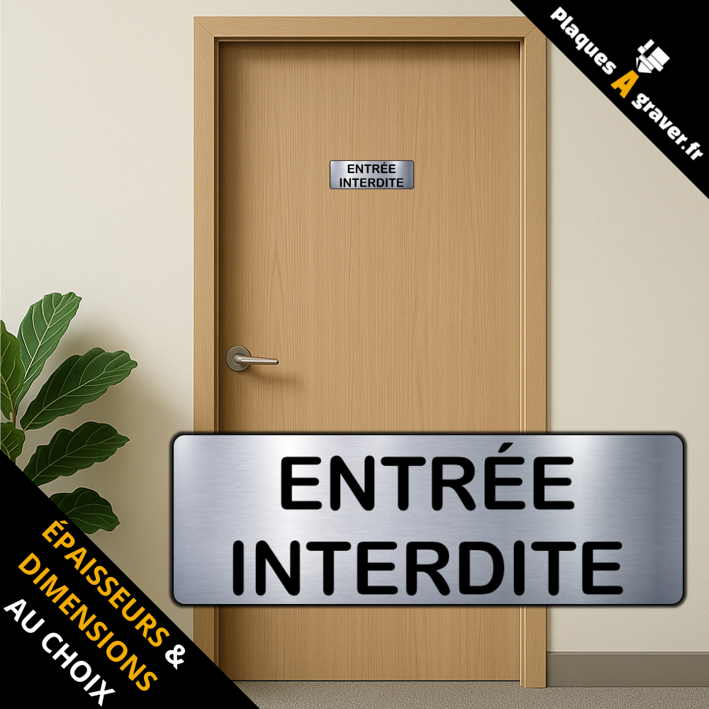 plaque Entrée interdite en PVC adhésive Plaques à Graver installée sur une porte de bâtiment professionnel